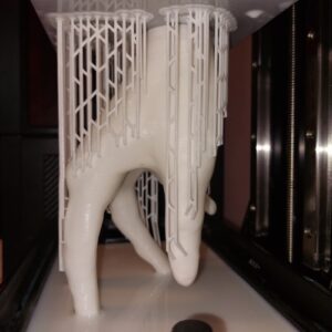 Frankenstein's hand growing out of vat of Light Link™ SLA resin made with Kynar® PVDF.